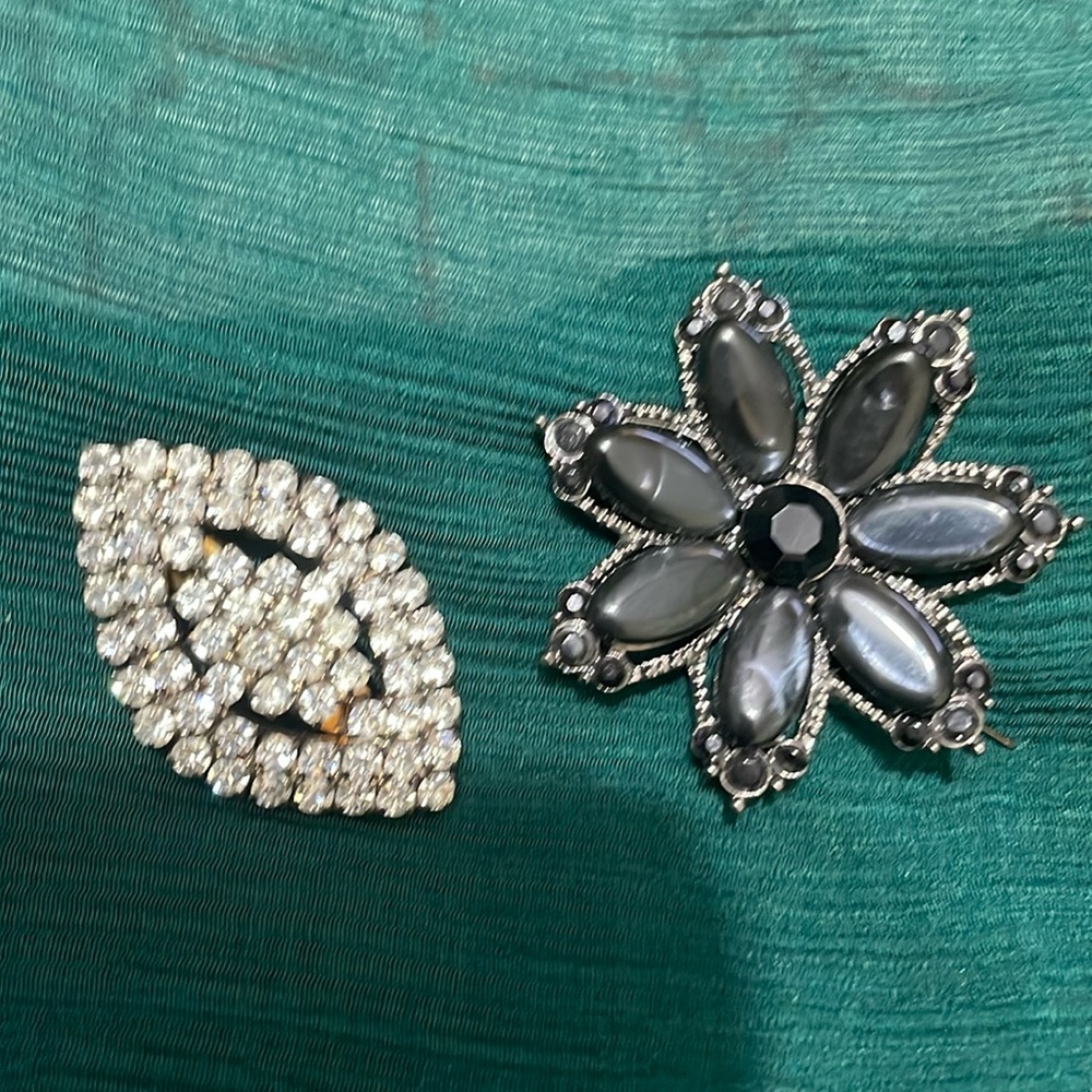 Black jet, Alaskan, diamond and rhinestone brooches